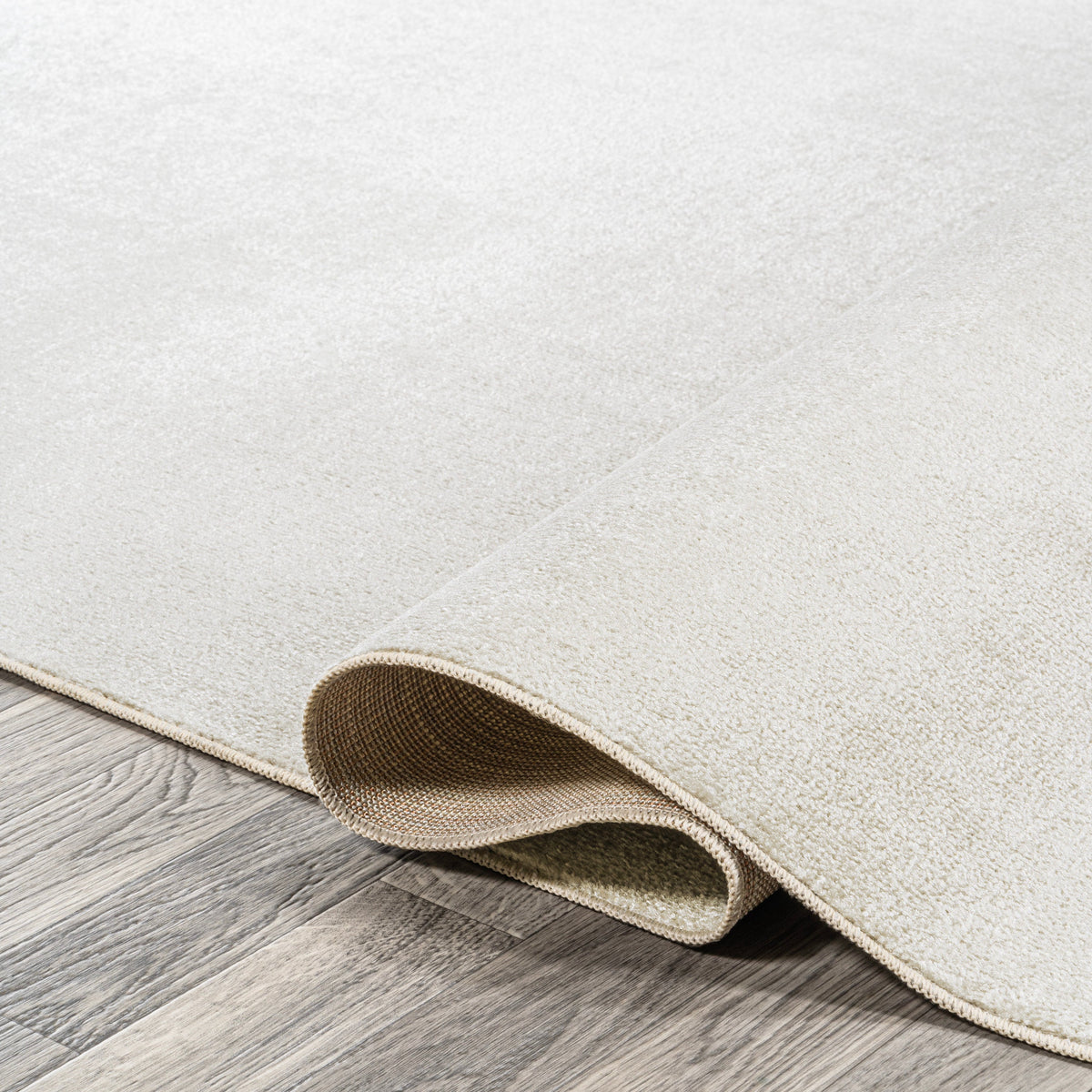 Twyla Classic Solid Low-Pile Machine-Washable Area Rug